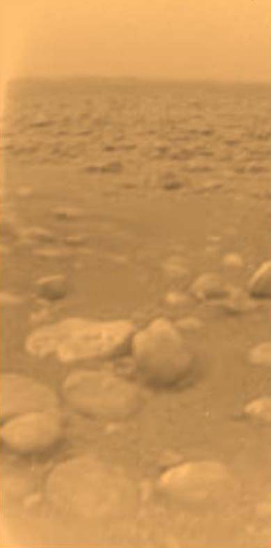 Huygens color picture from the surface of Titan. Image Credit: ESA/NASA/University of Arizona.