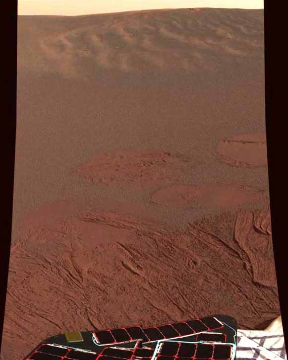 The first color image of the Martian surface sent back by the Mars Exploration Rover Opportunity.  Image credit NASA/JPL.