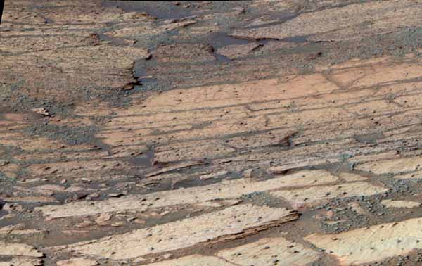 Layered rocks within Endurance crater.  Image credit NASA/JPL.