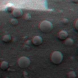 A close up 3d anaglyph of some spherical objects found in the Martian soil. Image credit NASA/JPL.